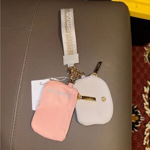 lululemon dual pouch wristlet pink /gold